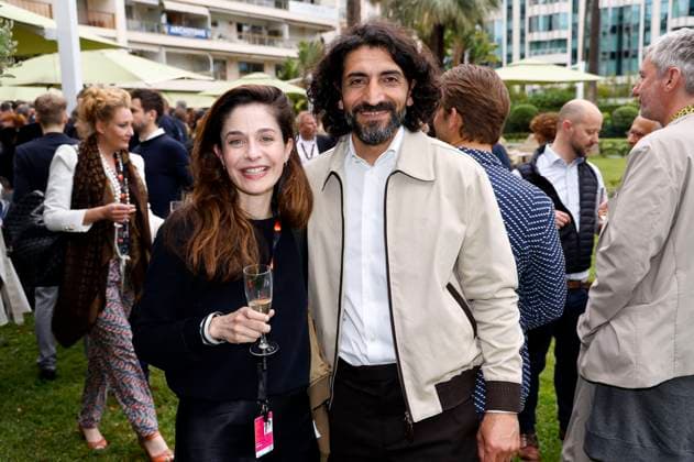 Anne Werner and Numan Acar at the German Films and Medienboard reception 2023 in the garden of the Hotel Mondrian Cannes at the Festival de Cannes 2023 76 Cannes International Film Festival Cannes, 20 05 2023 Foto:xS.xGabschx xFuturexImage