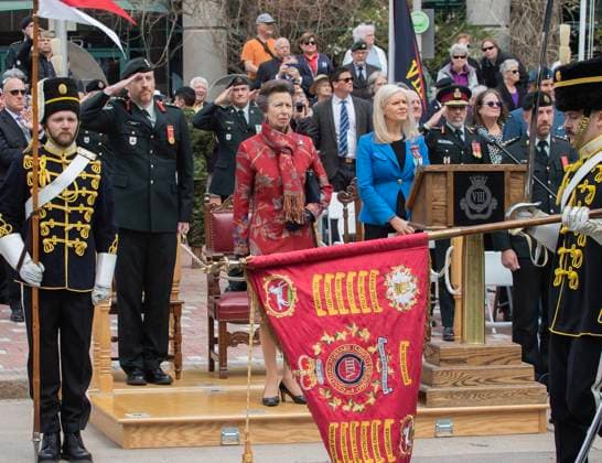 May 20, 2023, Moncton, NB, CANADA: Princess Anne (centre), Colonel Gregory Kennedy Command, 37 Canadian Brigade Group (left) and Moncton mayor Dawn Arnold (right) watch the march past during the 8th Canadian Hussars Exercise of the Freedom of the City of Moncton Parade on Saturday May 20, 2023. Moncton CANADA  - ZUMAc35_ 20230520_zaf_c35_058 Copyright: xRonxWardx