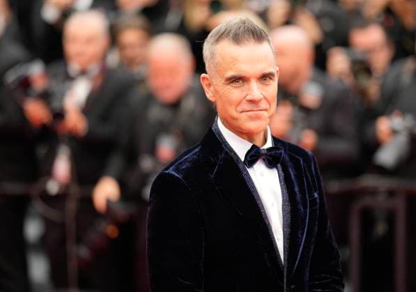 The Killers of the Flower Moon Red Carpet Premiere at the 76th Edition of the Cannes Film Festival Robbie Williams attends the movie screening and red carpet event for Killers of the Flower Moon , directed by Martin Scorsese, during the 76th edition of the Cannes Film Festival on May 20 2023, in Cannes, France Cannes Palace of Festivals and Congresses of Cannes Cannes France Copyright: xAlexandraxFechetex ImagoImages_EuroQualif_Rom-v-Bel-AF310
