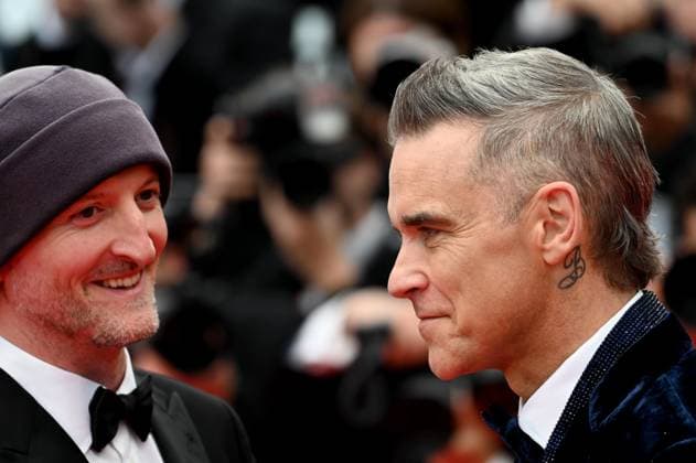 76th Cannes Film Festival 2023, evening 5 - red carpet of the film Killers Of The Flower Moon . In the photo: Director Director Michael Gracey , Robbie Williams,  Copyright: xManuelexMangiarottix xipa-agencyx xPoolxPhotoxEventsx01x IPA_IPA38085842