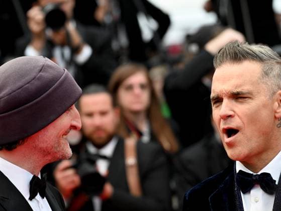 76th Cannes Film Festival 2023, evening 5 - red carpet of the film Killers Of The Flower Moon . In the photo: Director Director Michael Gracey , Robbie Williams,  Copyright: xManuelexMangiarottix xipa-agencyx xPoolxPhotoxEventsx01x IPA_IPA38085877