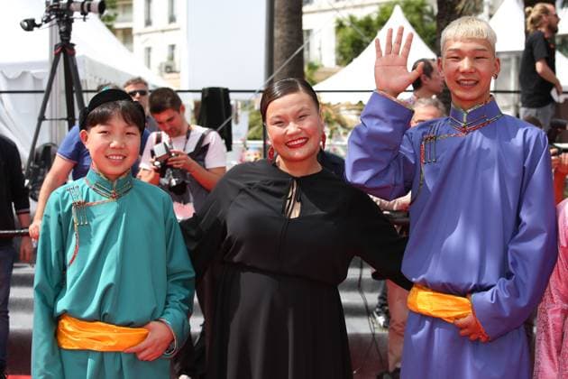 76e Festival International du Film de Cannes. MontÃ e des marches du film Anatomie d une chute . 76th Cannes Film Festival. Red carpet of the film Anatomie d une chute . Battsooj Uurtsaikh, Zoljargal Purevdash and Tuguldur Batsaikhan. 292310 2023-05-21 Cannes France  Copyright: xIsabellexVautierx xStarfacex STAR_292310_004