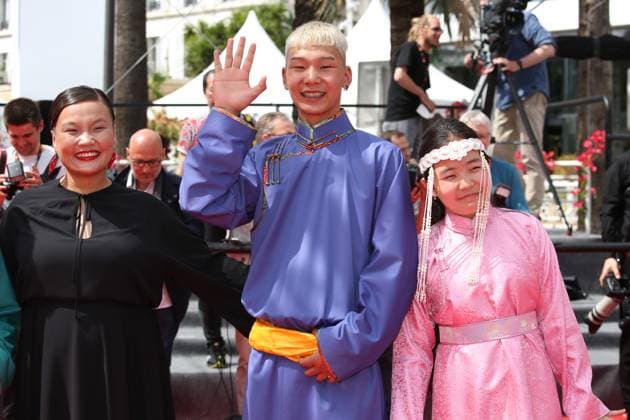 76e Festival International du Film de Cannes. MontÃ e des marches du film Anatomie d une chute . 76th Cannes Film Festival. Red carpet of the film Anatomie d une chute . Zoljargal Purevdash, Tuguldur Batsaikhan and Nominjiguur Tsend. 292310 2023-05-21 Cannes France  Copyright: xIsabellexVautierx xStarfacex STAR_292310_005