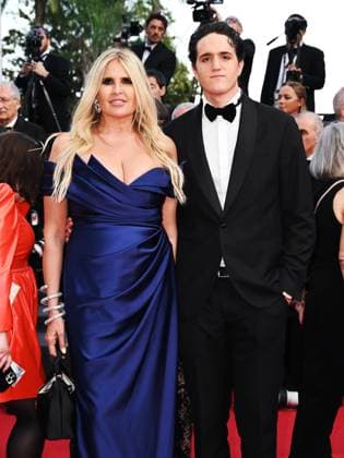 76th Cannes Film Festival 2023, evening 6 - red carpet of the film Firebrand (Le Jeu De La Reine) - Pictured: Tiziana Rocca with her son Vittorio Base  Copyright: xManuelexMangiarottix xipa-agencyx xPoolxPhotoxEventsx01x IPA_IPA38107857