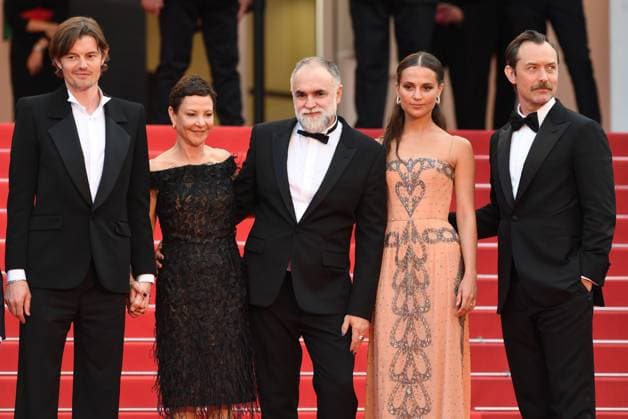Swedish actress Alicia Vikander, British actors Sam Riley, Jude Law, producer Gabrielle Tana and Brazilian director Karim Ainouz attend the premiere of Firebrand at the 76th Cannes Film Festival at Palais des Festivals in Cannes, France on Sunday, May 21, 2023.  CAN20230521177 RUNExHELLESTAD