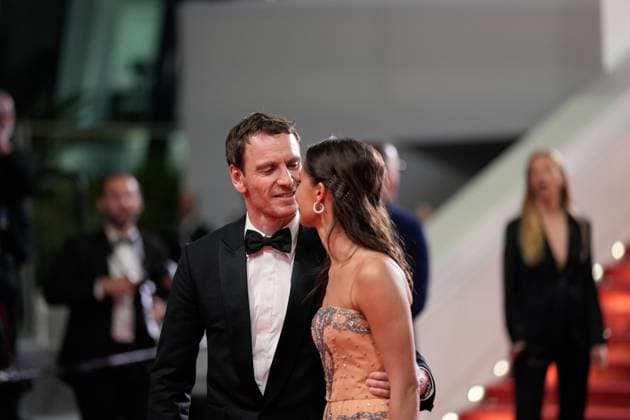 May 21, 2023, Cannes, Cannes, France: Actress Alicia Vikander and husband Michael Fassbender share a kiss, as they leave the movie screening and red carpet event for Firebrand , which is in competition during the 76th edition of the Cannes Film Festival on May 21 2023, in Cannes, France (c) IMAGO Images Cannes France - ZUMAf151 20230521_zsp_f151_061 Copyright: xAlexandraxFechetex