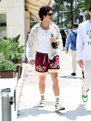 76th Cannes Film Festival 2023, day 7 - Charles Melton walking on the croisette  Copyright: xManuelexMangiarottix xipa-agencyx xPoolxPhotoxEventsx01x IPA_IPA38124669