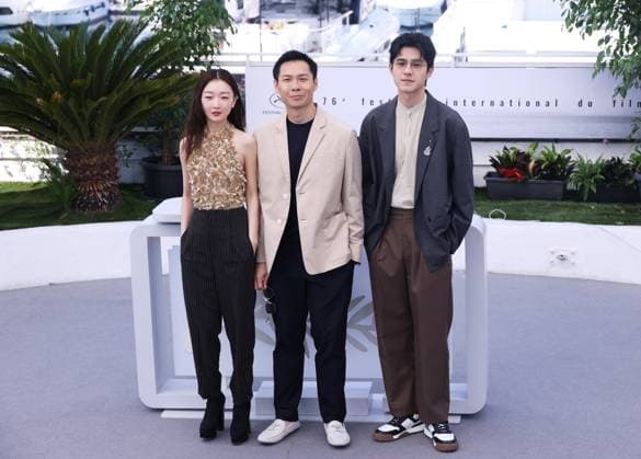 (230522) -- CANNES, May 22, 2023 -- Chinese actor Liu Haoran (R), Singaporean director Anthony Chen (C) and Chinese actress Zhou Dongyu pose during a photocall for the film Ran Dong (The Breaking Ice) at the 76th edition of the Cannes Film Festival in Cannes, southern France, on May 22, 2023. (Photo by Xinhua) FRANCE-CANNES-FILM FESTIVAL-THE BREAKING ICE-PHOTOCALL LixBohan 