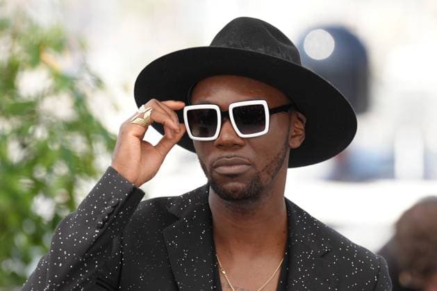 Baloji CELEBRITES : 76 eme festival de Cannes - Photocall du film Â« Augure (Omen) Â» - Cannes - 22 05 2023 NorbertScanella Panoramic 