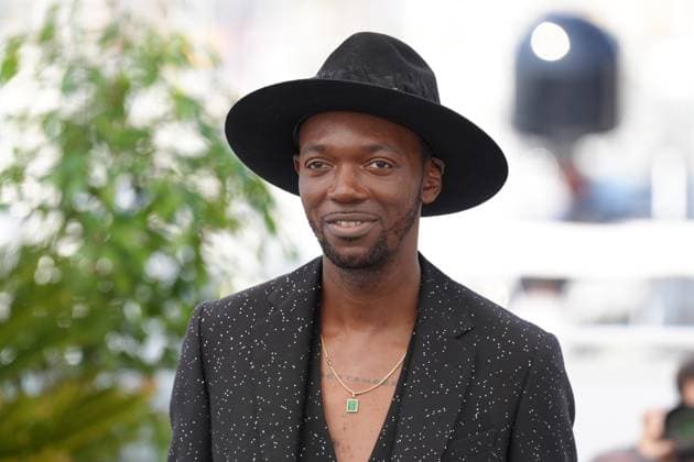 Baloji CELEBRITES : 76 eme festival de Cannes - Photocall du film Â« Augure (Omen) Â» - Cannes - 22 05 2023 NorbertScanella Panoramic 