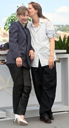French director Justine Triet and German actress Sandra Huller attend a photo call for Anatomy Of a Fall at the 76th Cannes Film Festival at Palais des Festivals in Cannes, France on Monday, May 22, 2023.  CAN20230522125 RUNExHELLESTAD