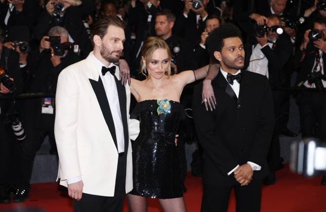 May 22, 2023, CANNES, FRANCE: Abel The Weeknd Tesfaye, Lily Rose Depp and Sam Levison attend the The Idol red carpet during the 76th annual Cannes film festival at Palais des Festivals on May 22, 2023 in Cannes, France. CANNES FRANCE - ZUMAs181 20230522_zea_s181_153 Copyright: xDGPx