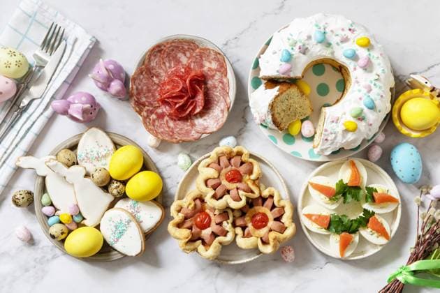 Festive dinner, Easter brunch. Easter table scene with an assortment of baking, desserts, stuffed eggs and dyed eggs on a marble background. View from above. Festive dinner, Easter brunch. Easter table scene with an assortment of baking, desserts, stuffed eggs and dyed eggs on a marble background. View from above. Copyright: xZoonar.com ELENAxHRAMOVAx 20013271