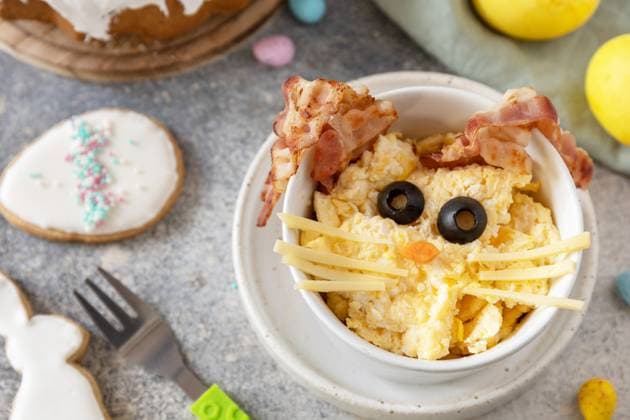 Scrambled eggs easter bunny on a stone background. Easter breakfast idea. Scrambled eggs easter bunny on a stone background. Easter breakfast idea. Copyright: xZoonar.com ELENAxHRAMOVAx 20013290