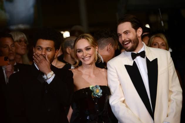 May 22, 2023, CANNES, France: CANNES, FRANCE - MAY 22: Abel The Weeknd Tesfaye, Lily-Rose Depp and Sam Levinson attend the The Idol red carpet during the 76th annual Cannes film festival at Palais des Festivals on May 22, 2023 in Cannes, France. CANNES France - ZUMAi09_ 20230522_zaf_i09_068 Copyright: xFrederickxInjimbertx