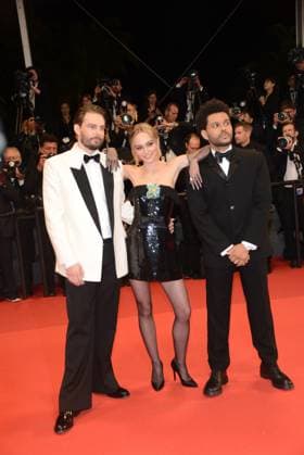 May 22, 2023, CANNES, France: CANNES, FRANCE - MAY 22: Abel The Weeknd Tesfaye, Lily-Rose Depp and Sam Levinson attend the The Idol red carpet during the 76th annual Cannes film festival at Palais des Festivals on May 22, 2023 in Cannes, France. CANNES France - ZUMAi09_ 20230522_zaf_i09_086 Copyright: xFrederickxInjimbertx
