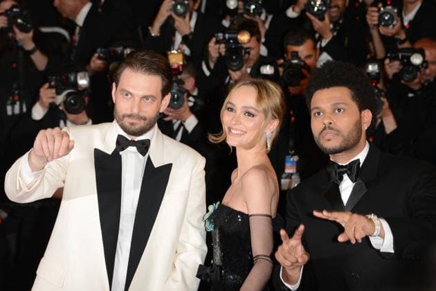 May 22, 2023, CANNES, France: CANNES, FRANCE - MAY 22: Abel The Weeknd Tesfaye, Lily-Rose Depp and Sam Levinson attend the The Idol red carpet during the 76th annual Cannes film festival at Palais des Festivals on May 22, 2023 in Cannes, France. CANNES France - ZUMAi09_ 20230522_zaf_i09_093 Copyright: xFrederickxInjimbertx