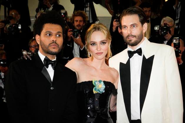 IPP Photo Daniele Cifala™ Cannes 22 05 2023 The Idol Red Carpet The 76th Annual Cannes Film Festival in the photo Canadian singer Abel Makkonen Tesfaye aka The Weeknd, French US actress Lily Rose Depp and US director Sam Levinson Italy Photo Press World Copyright  0
