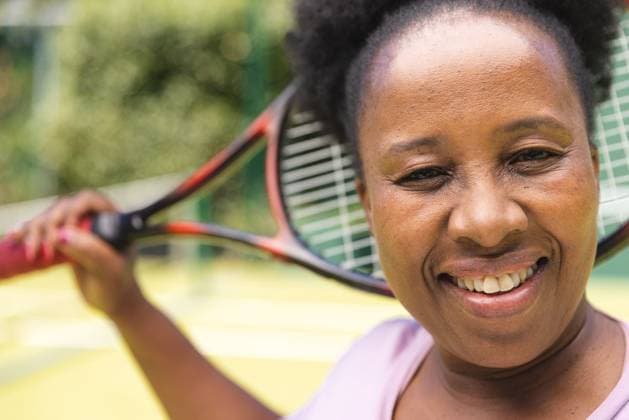 Portrait of senior african american woman with tennis racket smiling on sunny grass court Portrait of senior african american woman with tennis racket smiling on sunny grass court. Senior lifestyle, retirement, sport, summer, fitness, hobbies and leisure activities., model released, , property released, Cape Town, South Africa, 2023-01-25T22:00:00.000Z, 4016597.jpg, people,portrait,senior,african american,woman,tennis racket,smiling,sunny,grass,court,lifestyle,retirement,sport,summer,fitness,hobby,leisure activity,exercise,young,active,recreation,leisure,activity,happy,person,adult,outdoor,training,fit,workout,beautiful,nature,athlete,fun,healthy,attractive,african,american,tennis,racket Mature Adult,Woman,Female,Black