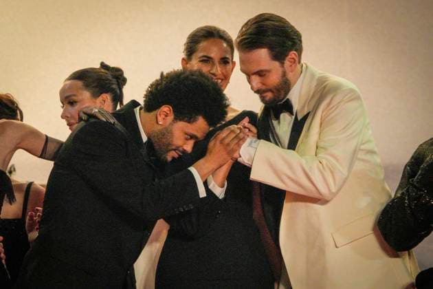 The Idol Red Carpet - The 76th Annual Cannes Film Festival Canadian singer Abel Makkonen Tesfaye aka The Weeknd (C-L) takes the hand of US director Sam Levinson attends The Idol Premiere Afterparty at the 76th annual Cannes film festival at Palm Beach on May 22, 2023 in Cannes, France. Cannes France  Copyright: xDanielexCifalÃ x originalFilename: cifala-notitle230523_np1Zy.jpg
