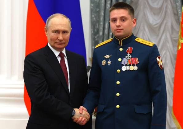 Russia Putin State Awards Presentation 8440328 23.05.2023 Russia s President Vladimir Putin awards Captain Dmitry Rasputikov of the 33rd separate special operations unit under the Central District Command of the Russian National Guard Forces, with the Order of Courage during a ceremony to present state decorations for achievements in the field of culture, cosmonautics, education and other areas at the Kremlin s St. Catherine Hall in Moscow, Russia. Vyacheslav Prokofyev POOL Moscow Russia  Copyright: xVyacheslavxProkofyevx