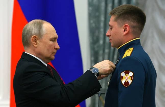Russia Putin State Awards Presentation 8440336 23.05.2023 Russia s President Vladimir Putin awards Captain Dmitry Rasputikov of the 33rd separate special operations unit under the Central District Command of the Russian National Guard Forces, with the Order of Courage during a ceremony to present state decorations for achievements in the field of culture, cosmonautics, education and other areas at the Kremlin s St. Catherine Hall in Moscow, Russia. Vyacheslav Prokofyev POOL Moscow Russia  Copyright: xVyacheslavxProkofyevx