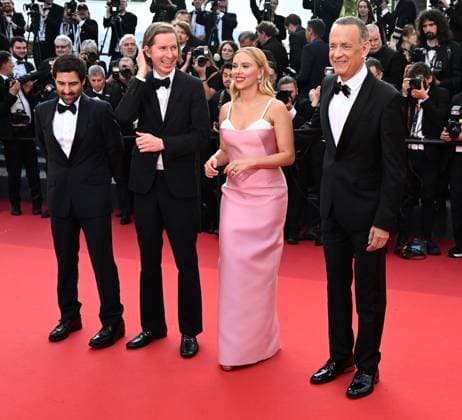 American director Wes Anderson, actress Scarlett Johansson, actors Jason Scwarzman and Tom Hanks attend the premiere of Asteroid City at the 76th Cannes Film Festival at Palais des Festivals in Cannes, France on Tuesday, May 23, 2023.  CAN20230523185 RUNExHELLESTAD