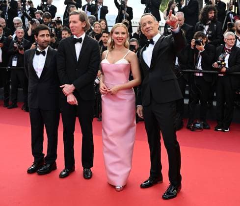 American director Wes Anderson, actress Scarlett Johansson, actors Jason Scwarzman and Tom Hanks attend the premiere of Asteroid City at the 76th Cannes Film Festival at Palais des Festivals in Cannes, France on Tuesday, May 23, 2023.  CAN20230523186 RUNExHELLESTAD