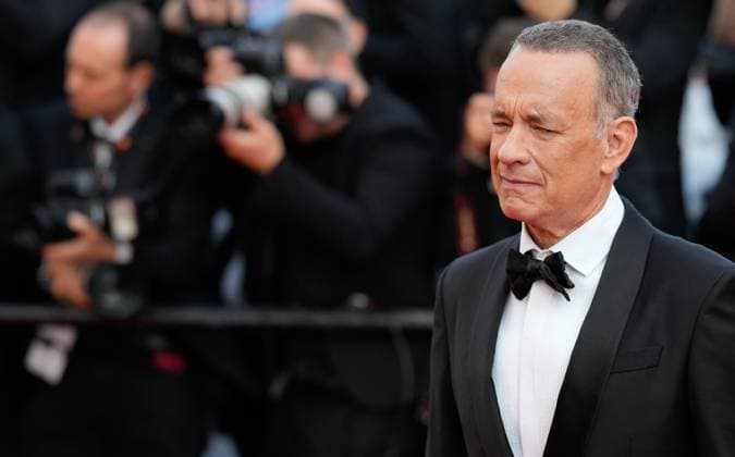 The Asteroid City Red Carpet Premiere at the 76th Edition of the Cannes Film Festival Actor Tom Hanks attends the movie screening and red carpet event for Asteroid City , directed by Wes Anderson, which is in competition, during the 76th edition of the Cannes Film Festival on May 23 2023, in Cannes, France Cannes Palace of Festivals and Congresses of Cannes Cannes France Copyright: xAlexandraxFechetex _ADR1805