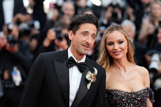 The Asteroid City Red Carpet Premiere at the 76th Edition of the Cannes Film Festival Actor Adrien Brody and Georgina Chapman attend the movie screening and red carpet event for Asteroid City , directed by Wes Anderson, which is in competition, during the 76th edition of the Cannes Film Festival on May 23 2023, in Cannes, France Cannes Palace of Festivals and Congresses of Cannes Cannes France Copyright: xAlexandraxFechetex _ADR1511