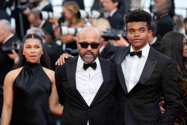 The Asteroid City Red Carpet Premiere at the 76th Edition of the Cannes Film Festival Actor Jeffrey Wright with his children Elijah Wright and Juno Wright attend the movie screening and red carpet event for Asteroid City , directed by Wes Anderson, which is in competition, during the 76th edition of the Cannes Film Festival on May 23 2023, in Cannes, France Cannes Palace of Festivals and Congresses of Cannes Cannes France Copyright: xAlexandraxFechetex _ADR1569