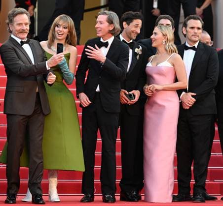 American actresses Maya Hawke, Scarlett Johansson, director Wes Anderson, actors Bryan Cranston, Adrien Brody and Matt Dillon attend the premiere of Asteroid City at the 76th Cannes Film Festival at Palais des Festivals in Cannes, France on Tuesday, May 23, 2023.  CAN20230523174e RUNExHELLESTAD