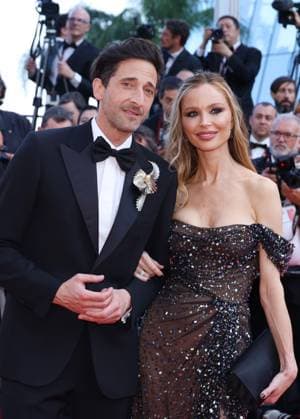 May 23, 2023, CANNES, FRANCE: Adrien Brody, Georgina Chapman attend the Asteroid City red carpet during the 76th annual Cannes film festival at Palais des Festivals on May 23, 2023 in Cannes, France. CANNES FRANCE - ZUMAs181 20230523_zea_s181_026 Copyright: xDGPx