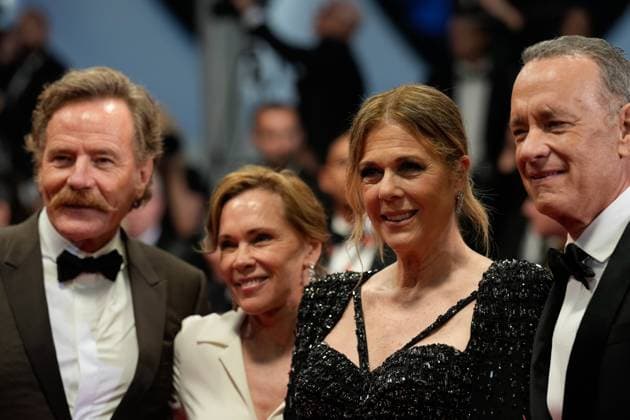 The Asteroid City Red Carpet Premiere at the 76th Edition of the Cannes Film Festival Actors Bryan Cranston and Tom Hanks, together with Rita Wilson and Robin Dearden, leave the movie screening and red carpet event for Asteroid City , directed by Wes Anderson, which is in competition, during the 76th edition of the Cannes Film Festival on May 23 2023, in Cannes, France Cannes Palace of Festivals and Congresses of Cannes Cannes France Copyright: xAlexandraxFechetex _ADR3474