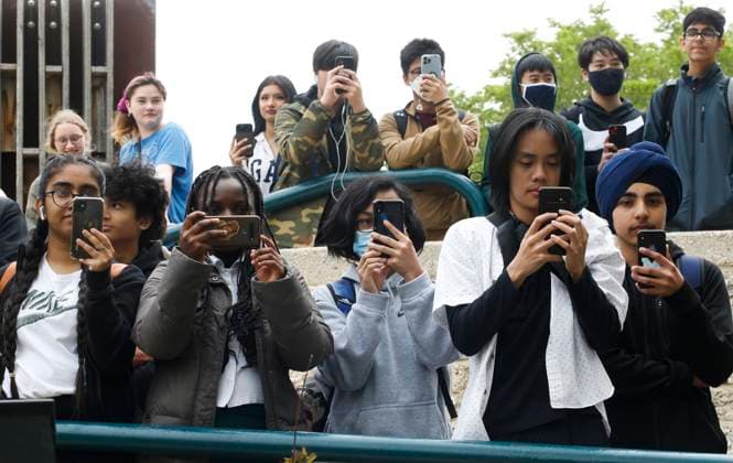 May 24, 2023, WINNIPEG, MANITOBA, CANADA: High school students photograph Prime Minister Justin Trudeau as he announces a water research project at The Forks in Winnipeg, Wednesday, May 24, 2023. WINNIPEG CANADA  - ZUMAc35_ 20230524_zaf_c35_087 Copyright: xJohnxWoodsx