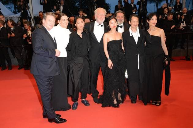 May 24, 2023, CANNES, France: CANNES, FRANCE - MAY 24: (L-R) Benoit Magimel, Juliette Binoche, a guest, Pierre Gagnaire, a guest, Director Tran Anh Hung and Tran Nu Yen Khe depart the La Passion De Dodin Bouffant red carpet during the 76th annual Cannes film festival at Palais des Festivals on May 24, 2023 in Cannes, France. CANNES France - ZUMAi09_ 20230524_zaf_i09_002 Copyright: xFrederickxInjimbertx