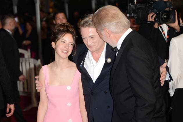 May 24, 2023, CANNES, France: CANNES, FRANCE - MAY 24: Bonnie Chagneau-Ravoire and Benoit Magimel and a guest depart the La Passion De Dodin Bouffant red carpet during the 76th annual Cannes film festival at Palais des Festivals on May 24, 2023 in Cannes, France. CANNES France - ZUMAi09_ 20230524_zaf_i09_007 Copyright: xFrederickxInjimbertx