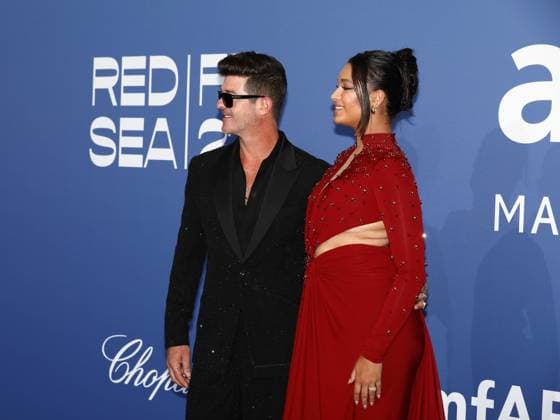 May 25, 2023, Antibes, Cote d Azur, France: American singer ROBIN THICKE and his partner APRIL LOVE GEARY attend the amfAR Gala during the 76th Annual Cannes Film Festival at Palais des Festivals on May 25, 2023 in Cannes, France Antibes France - ZUMAc179 20230525_zep_c179_027 Copyright: xMickaelxChavetx