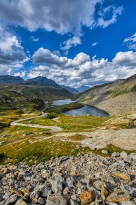 A vertical shot of the beautiful Colle del Nivolet with lake and mountains in Gran Paradiso, Italy *** einer hoch erschossen des der Schönes Colle Entf Nivolet mit See und Gebirge ÊIn Gran Paradiso, Italien 7839105 RECORD DATE NOT STATED