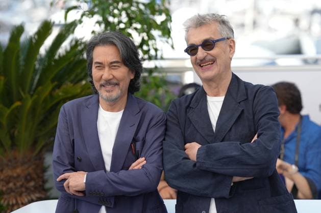 KÅji Yakusho - Wim Wenders CELEBRITES : 76 eme festival de Cannes - Red Carpet du film Â« Perfect Days Â» - Cannes - 26 05 2023 NorbertScanella Panoramic 