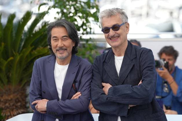 KÅji Yakusho - Wim Wenders CELEBRITES : 76 eme festival de Cannes - Red Carpet du film Â« Perfect Days Â» - Cannes - 26 05 2023 NorbertScanella Panoramic 