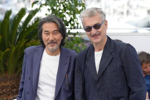 KÅji Yakusho - Wim Wenders CELEBRITES : 76 eme festival de Cannes - Red Carpet du film Â« Perfect Days Â» - Cannes - 26 05 2023 NorbertScanella Panoramic 