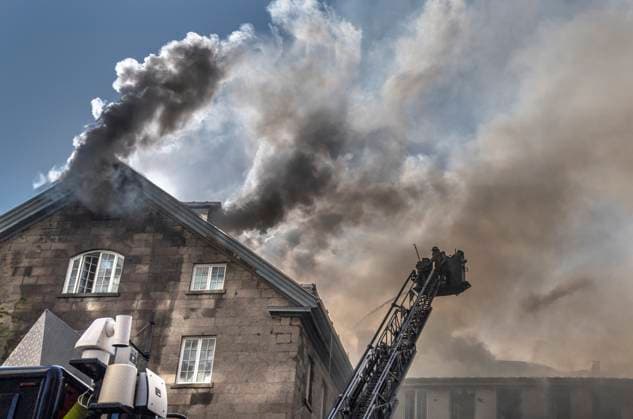 May 26, 2023, MONTREAL, PQ, CANADA: Firefighters respond to a five-alarm fire at the former Monastere du Bon Pasteur, a 19th century heritage building on Friday May 26, 2023 in Montreal. MONTREAL CANADA  - ZUMAc35_ 20230526_zaf_c35_001 Copyright: xChristinnexMuschix