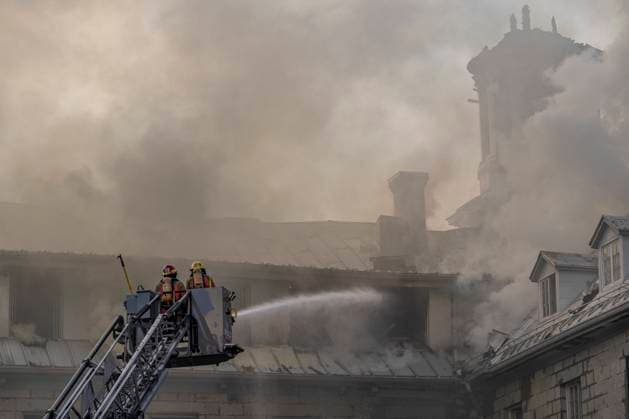 May 26, 2023, MONTREAL, PQ, CANADA: Firefighters respond to a five-alarm fire at the former Monastere du Bon Pasteur, a 19th century heritage building on Friday May 26, 2023 in Montreal. MONTREAL CANADA  - ZUMAc35_ 20230526_zaf_c35_005 Copyright: xChristinnexMuschix