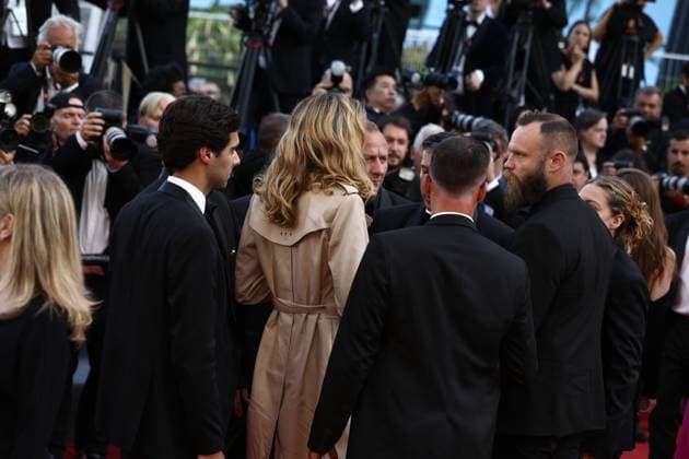 May 26, 2023, Cannes, Cote d Azur, France: Security agents forbid ALINA BAIKOVA to show her Fuck You Putin t-shirt as she was meant to attend the screening of The Old Oak during the 76th Annual Cannes Film Festival at Palais des Festivals on May 26, 2023 in Cannes, France Cannes France - ZUMAc179 20230526_zep_c179_062 Copyright: xMickaelxChavetx