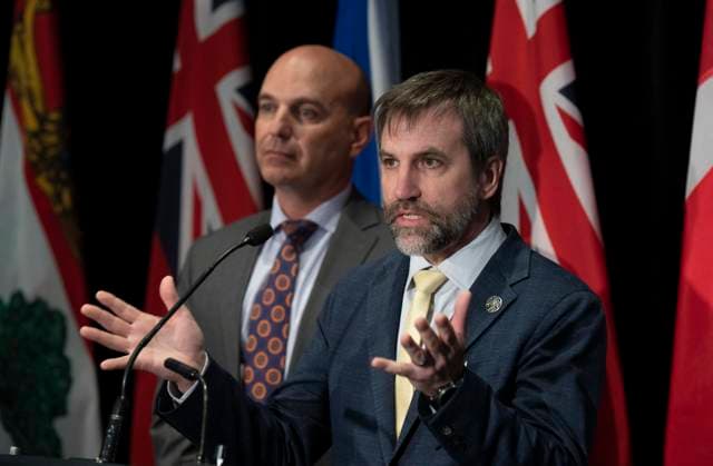 News Bilder des Tages May 26, 2023, Ottawa, ON, Canada: British Colombia Minister of Land, Water, and Resource Stewardship Nathan Cullen look on as Minister of Environment and Climate Change Steven Guilbeault responds to a question during a news conference following meetings Friday, May 26, 2023 in Ottawa. Ottawa Canada  - ZUMAc35_ 20230526_zaf_c35_048 Copyright: xAdrianxWyldx