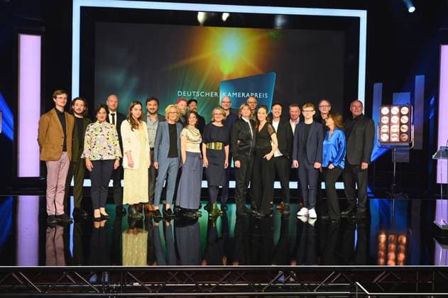 Group picture of the award winners, laudators and responsible persons at the 33 German Camera Award ceremony, the most prestigious award for cinematographers and editors.