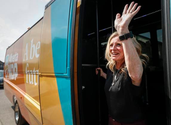 May 26, 2023, Calgary, AB, CANADA: Alberta NDP leader Rachel Notley waves from her bus as she leaves a campaign stop at a backyard party in Calgary, Alta., Friday, May 26, 2023. Albertans go to the polls on May 29. Calgary CANADA  - ZUMAc35_ 20230526_zaf_c35_064 Copyright: xJeffxMcintoshx