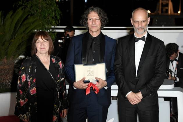 76th Cannes Film Festival 2023, Photocall Palmares. Pictured Ewa Puszczynska, Jonathan Glazer, James Wilson  Copyright: xAlbertoxTerenghix xipa-agency.nex xPoolxPhotoxEventsx01x IPA_IPA38278579