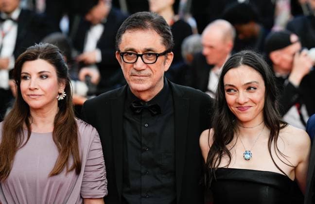 The Elemental Red Carpet Premiere at the 76th Edition of the Cannes Film Festival Merve Dizdar, winner of the Best Actress Award for the movie About Dry Grasses ( Kuru Otlar Üstüne ), Director Nuri Bilge Ceylan, and Ebru Ceylan attend the movie screening and red carpet event for Elemental , directed by Peter Sohn, during the 76th edition of the Cannes Film Festival on May 27 2023, in Cannes, France Cannes Palace of Festivals and Congresses of Cannes Cannes France Copyright: xAlexandraxFechetex _ADR9756